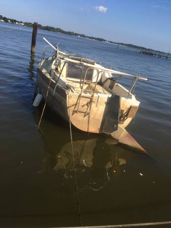 Old boat in water